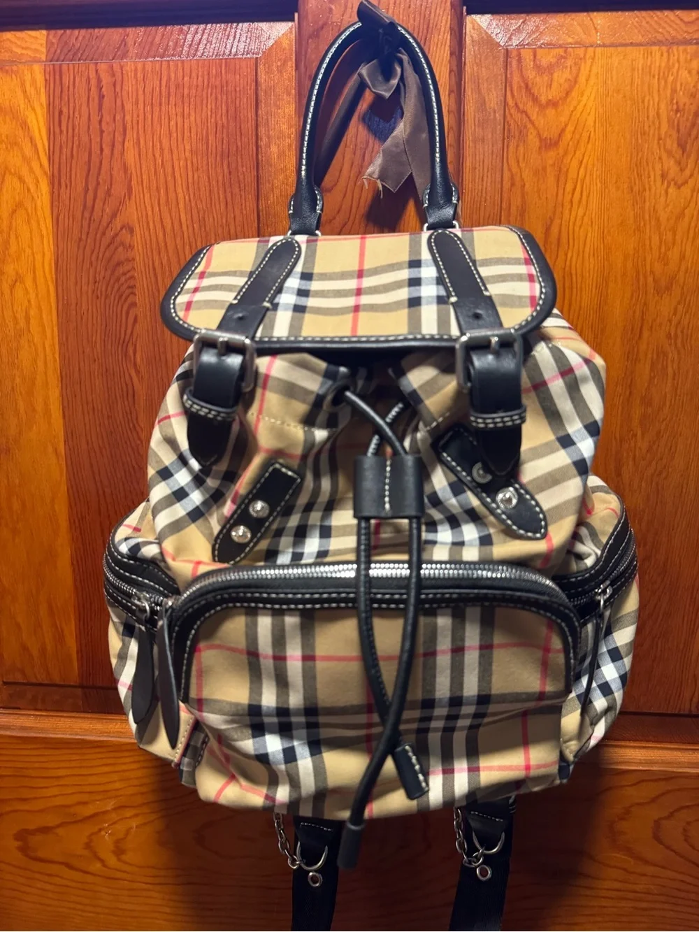 Burberry Nova Check Backpack with black trim and top handle excellent condition